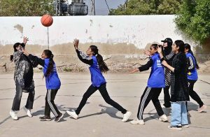 A view of basketball match between Shah Latif Girls College and ISRA Foundation School teams during 5th Hyderabad Olympic Games at Board Stadium.