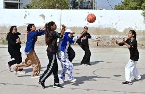 A view of basketball match between Shah Latif Girls College and ISRA Foundation School teams during 5th Hyderabad Olympic Games at Board Stadium.