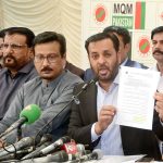 Federal Minister for National Health Services, Regulations and Coordination, Syed Mustafa Kamal, along with MQM-Pakistan MNAs, addresses a press conference at Bahadurabad