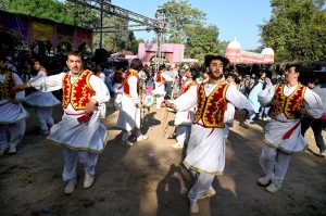 Folk artists performing on stage during the Ten-Day annual folk festival “Lok Mela 2025” at Lok Virsa