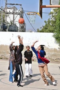 A view of basketball match between Shah Latif Girls College and ISRA Foundation School teams during 5th Hyderabad Olympic Games at Board Stadium.