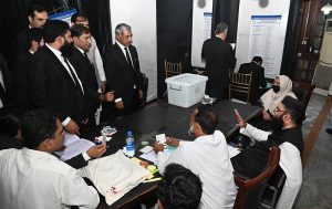 Advocate General Punjab Amjad Pervaiz and Returning Officer for Punjab Bar Council elections visiting polling booths during the Punjab Bar Council elections at the Lahore High Court.