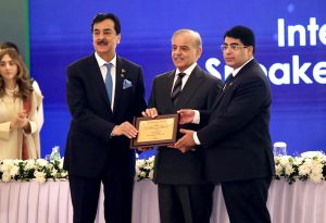 Prime Minister Muhammad Shehbaz Sharif and Founding Chairman ISC/Chairman Senate Syed Yousaf Raza Gillani presents a shield to Secretary General ISC Ek Nath Dhakal at the inaugural session of the Inter-Parliamentary Speakers’ Conference “Peace, Security and Development”.