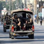 Security personnel maintain a vigilant watch outside the Rawalpindi Cricket Stadium as crowds gather for the high-energy second One Day International between Pakistan and Sri Lanka.