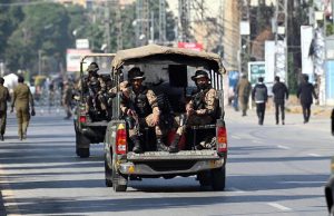 Security personnel maintain a vigilant watch outside the Rawalpindi Cricket Stadium as crowds gather for the high-energy second One Day International between Pakistan and Sri Lanka.