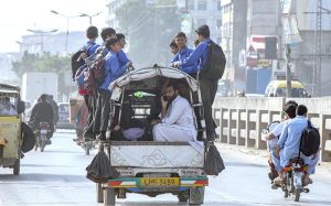 Traditional drummers, who usually perform at wedding ceremonies, are waiting to be hired at their roadside setup