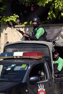 Security personnel maintain a vigilant watch outside the Rawalpindi Cricket Stadium as crowds gather for the high-energy second One Day International between Pakistan and Sri Lanka.