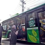 Passengers disembark from Rawalpindi's newly launched first electric bus service, inaugurated by Chief Minister Maryam Nawaz, marking a major step toward eco-friendly modern, and affordable transport for residents of the twin cities
