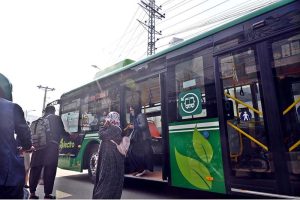 Passengers disembark from Rawalpindi's newly launched first electric bus service, inaugurated by Chief Minister Maryam Nawaz, marking a major step toward eco-friendly modern, and affordable transport for residents of the twin cities