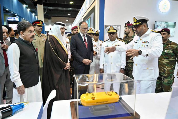 Federal Minister for Planning, Development and Special Initiatives, Ahsan Iqbal along with others visiting after inauguration ceremony of Pakistan International Maritime Expo & Conference PIMEC-2025 at Expo Centre