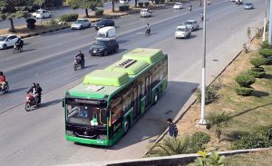 Passengers disembark from Rawalpindi's newly launched first electric bus service, inaugurated by Chief Minister Maryam Nawaz, marking a major step toward eco-friendly modern, and affordable transport for residents of the twin cities