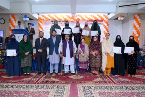 Executive Director strategy and Coordination City University Science & Information Technology Muhammad Ayoub Sethi presenting a shield to Secretary Mardan Board Prof. Hazrat Ali during Academic Excellence Award Ceremony 2025 of PMDC