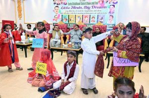 Students of different government primary schools performing in tableau during function "Early Childhood Talent Show and Fair Little Minds Big Dreams" organized by District Education Officer Primary.
