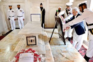 Federal Minister for National Food Security and Research Rana Tanveer Hussain laying floral wreaths during change of guard ceremony to pay homage to the National Poet Allama Muhammad Iqbal on his 148th birthday anniversary at Mazar-e-Iqbal