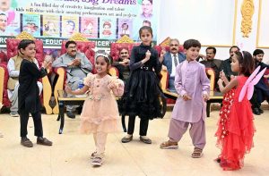 Students of different government primary schools performing in tableau during function "Early Childhood Talent Show and Fair Little Minds Big Dreams" organized by District Education Officer Primary.