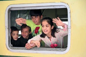 Families of hindu community boarding a special train heading to Lahore to attend the 556th birth anniversary celebrations of Guru Nanak Dev Ji in Nankana Sahib.