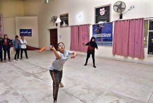 Players in action during an inter-collegiate badminton tournament organized by the Sports Board of the Education Board at Government Degree College for Women