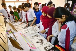 Students visiting different stalls during Science & Art Exhibition of TABS School & College at Autobahn Road