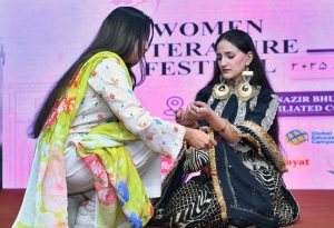 Female students perform a stage drama highlighting women empowerment during the inauguration ceremony of the Dosti Peshawar Women Literature Festival (3rd Edition).