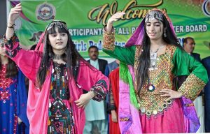 Students perform a tableau during the closing ceremony of the All Pakistan Inter Board Girls Badminton Championship 2025 at the Officers Club, organized by the Larkana Board of Intermediate and Secondary Education.