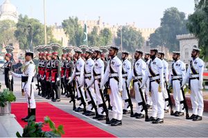 Commander Central Punjab, Rear Admiral Sohail Ahmed Azmie steps forward at Mazar-e-Iqbal to lay floral wreath during change of guard ceremony to pay homage to the national poet, Allama Muhammad Iqbal on his 148th birthday anniversary