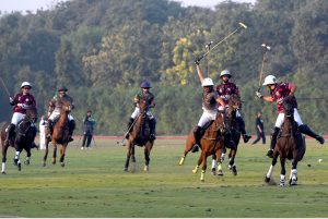 Players struggling to get hold on the ball during the final polo match playing between Master Paints and FG/Din Polo teams at Lahore Polo Club during LPC Polo Cup 2025. FG/Din polo team won by 8-6
