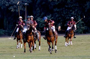 Players struggling to get hold on the ball during the final polo match playing between Master Paints and FG/Din Polo teams at Lahore Polo Club during LPC Polo Cup 2025. FG/Din polo team won by 8-6