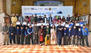Child Protection Officer UNICEF Sumbal Gillani in a group photo along with the Social Welfare team and other officials and participants during celebrating Universal Children’s Day arranged by Social Welfare department with the support of UNICEF at UPS.