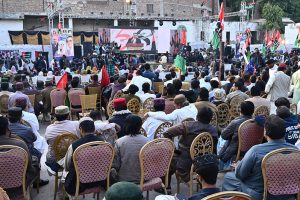 A large crowd of party workers watches and listens to PPP Chairman Bilawal Bhutto Zardari’s live speech on a big screen during the 58th PPP Foundation Day at Dialdas Club