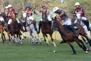Players struggling to get hold on the ball during the final polo match playing between Master Paints and FG/Din Polo teams at Lahore Polo Club during LPC Polo Cup 2025. FG/Din polo team won by 8-6