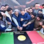Sindh Minister for Irrigation Jam Khan Shoro and others cut the cake during the 58th PPP Foundation Day at Dialdas Club
