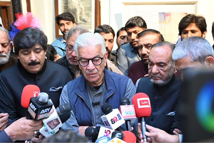 Defense Minister Khawaja Muhammad Asif is talking to media personnel on the occasion to celebrate the 148th birth anniversary of national poet Dr. Allama Muhammad Iqbal