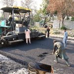 CDA workers carry out maintenance and carpeting work on the I-9 service road, ensuring smoother commutes in the federal capital.