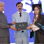 Defence Minister Khawaja Muhammad Asif distributes certificates and shields to successful students during the 14th convocation of Shadab Girls College