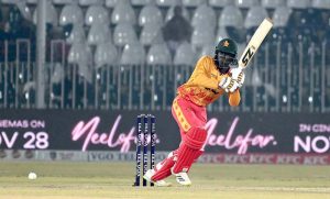 Zimbabwe batsman Tadiwanashe Marumani plays a shot during the Pakistan T20I Tri-Nation Series cricket match against Pakistan in Rawalpindi stadium