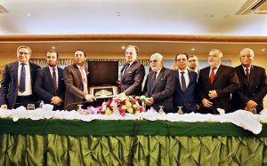 Federal Minister for Finance and Revenue Senator Muhammad Aurangzeb addresses members of the Karachi Chamber of Commerce and Industry (KCCI).