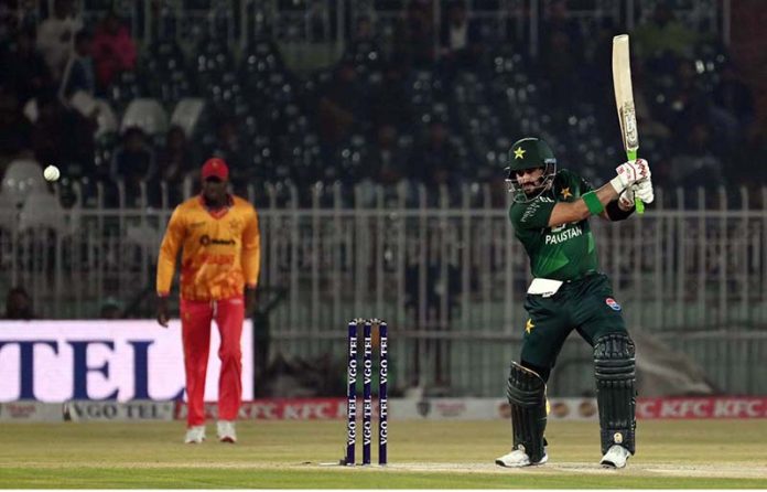 Pakistani batter Sahibzada Farhan plays a shot during the Pakistan T20I Tri-Nation Series cricket match between Zimbabwe and Pakistan at Pindi Cricket Stadium