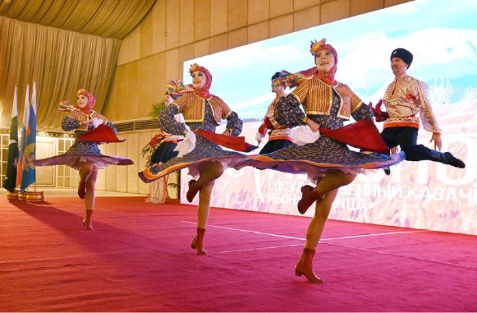 Russian artists showing their performance during a ceremony marking the People’s Unity Day of the Russian Federation at a local hotel