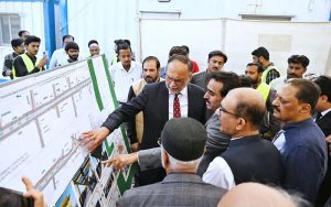 Federal Minister for Planning, Development and Special Initiatives Ahsan Iqbal receiving a briefing on the Green Line Project from officials