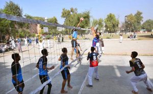 Volleyball players are in action during Annual Sports Tournament 2025 of Government Middle Schools District Peshawar.