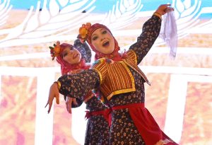 Russian artists showing their performance during a ceremony marking the People’s Unity Day of the Russian Federation at a local hotel
