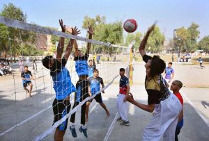 Volleyball players are in action during Annual Sports Tournament 2025 of Government Middle Schools District Peshawar.