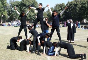 Students from Special Persons School perform a tableau at the opening ceremony of the Sports Gala 2025 for persons with special needs at a stadium in Bahawalpur