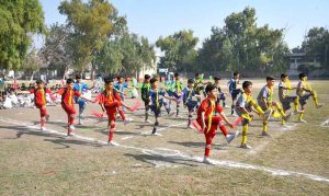 Volleyball players are in action during Annual Sports Tournament 2025 of Government Middle Schools District Peshawar.