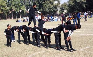 Students from Special Persons School perform a tableau at the opening ceremony of the Sports Gala 2025 for persons with special needs at a stadium in Bahawalpur