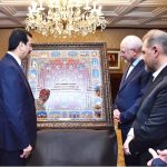 H.E. Dr. Mohammad Bagher Ghalibaf, Speaker of the Islamic Consultative Assembly of Iran presenting a painting to Acting President Syed Yousuf Raza Gilani at Aiwan-e-Sadr
