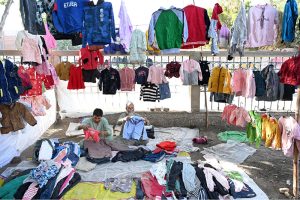 Students looking to buy used old shoes at old Bus Stand Road