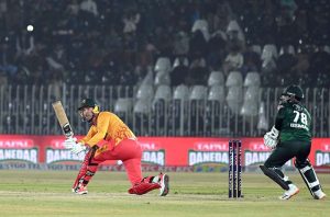 Zimbabwe batsman Tadiwanashe Marumani plays a shot during the Pakistan T20I Tri-Nation Series cricket match against Pakistan in Rawalpindi stadium