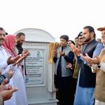 Commissioner Amir Kareem Khan offers dua after unveiling the plaque during the groundbreaking ceremony of a beautification project along a 9-kilometre stretch of the N-5 road, from Syedwala Chowk to Saho Chowk