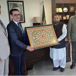 Ambassador of Tajikistan Sharifzoda Yusuf Toirali presenting traditional Tajik handicraft gift to the Federal Minister for National Heritage and Culture Division Aurangzeb Khan Khichi